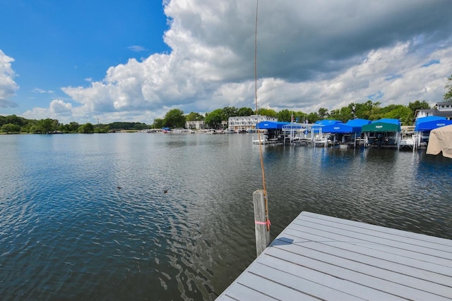 view of dock with a water view