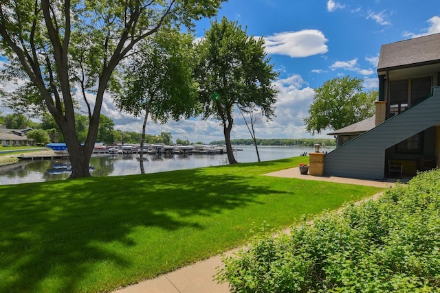 view of yard with a water view