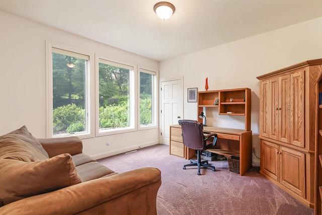 carpeted office with baseboards