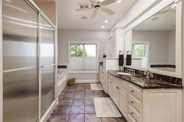 bathroom with a garden tub, a ceiling fan, tile patterned floors, vanity, and recessed lighting