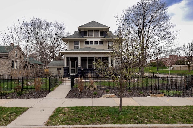 1324 Washington Ave, Oshkosh, WI 54901 - traditional style home with a fenced front yard and roof with shingles