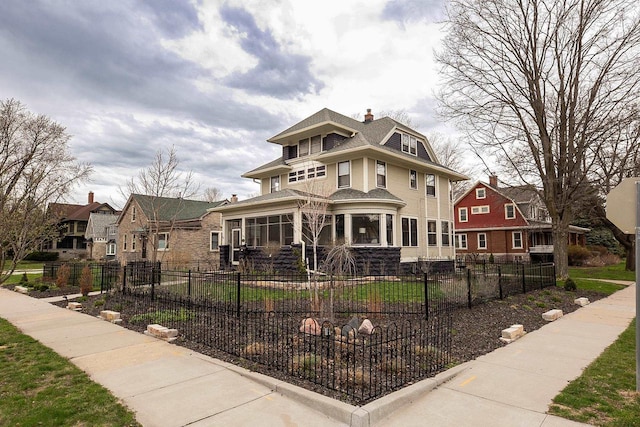 1324 Washington Ave, Oshkosh, WI 54901 - traditional style home featuring a chimney and fence private yard