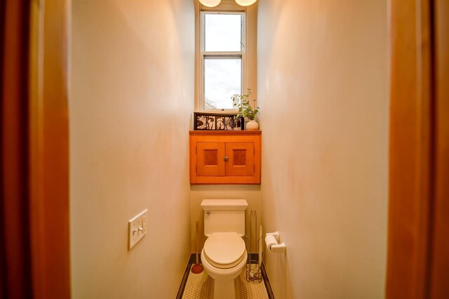 1324 Washington Ave, Oshkosh, WI 54901 - bathroom featuring baseboards and toilet