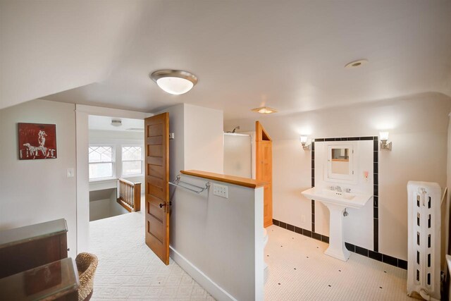 1324 Washington Ave, Oshkosh, WI 54901 - corridor with radiator and baseboards
