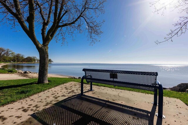 1324 Washington Ave, Oshkosh, WI 54901 - view of home's community featuring a water view and a patio area