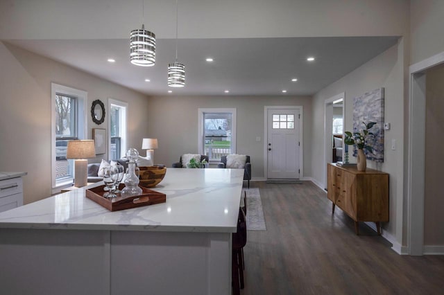 3326 6 Mile Rd, Racine, WI 53402 - kitchen featuring a center island, dark wood-style floors, recessed lighting, and baseboards