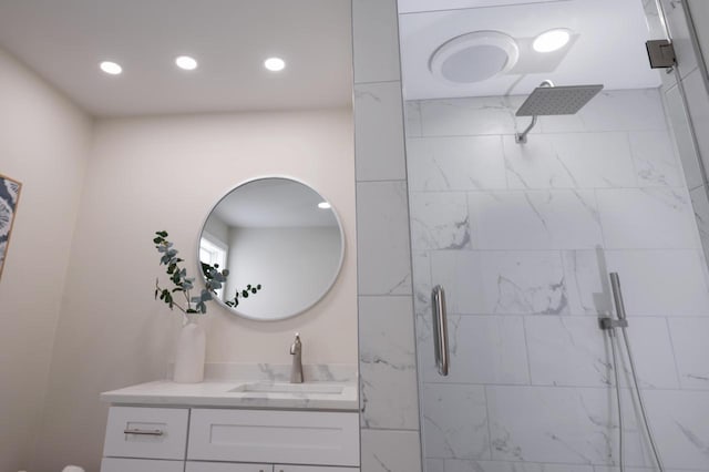 3326 6 Mile Rd, Racine, WI 53402 - bathroom featuring a stall shower, recessed lighting, and vanity