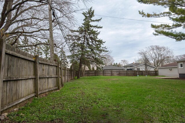 3326 6 Mile Rd, Racine, WI 53402 - view of yard featuring a fenced backyard