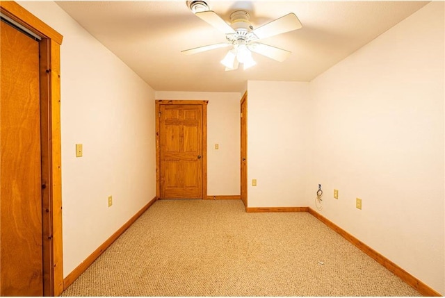 2374 320th St, Clear Lake, WI 54005 - unfurnished room featuring light colored carpet, a ceiling fan, and baseboards