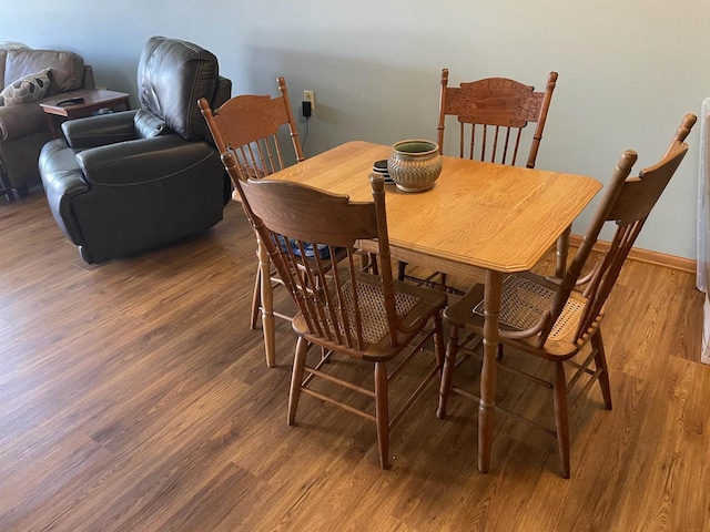 dining room with light wood finished floors