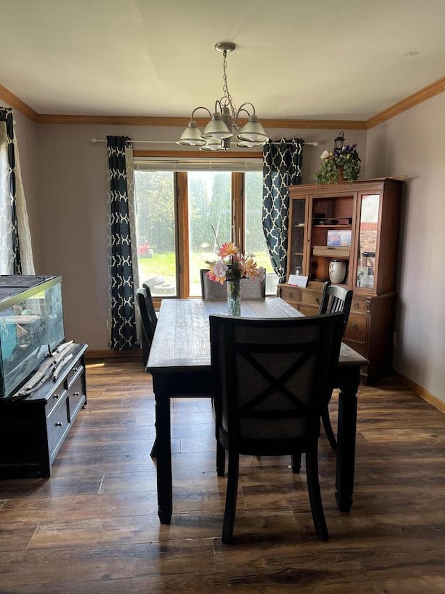 4327 29th St, Kenosha, WI 53144 - dining area with a chandelier, crown molding, dark wood-style floors, and baseboards