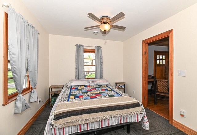 4308 W Dr, Delavan, WI 53115 - bedroom with ceiling fan and baseboards