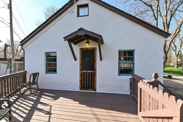 4308 W Dr, Delavan, WI 53115 - exterior space with a wooden deck and stucco siding