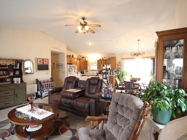 living room with lofted ceiling and ceiling fan