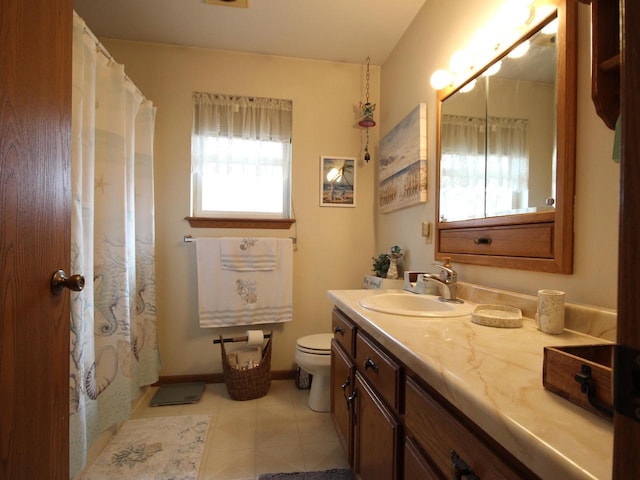 bathroom featuring toilet, a shower with curtain, and vanity