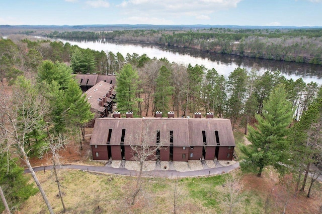 aerial view featuring a water view and a view of trees