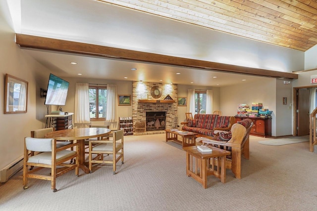 living area featuring a brick fireplace, a wealth of natural light, and light colored carpet