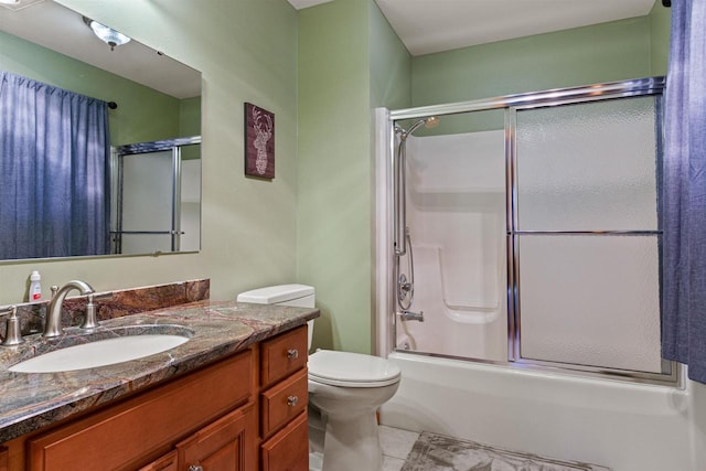 W4895 Big Bay Rd, Necedah, WI 54646 - full bathroom with tile patterned flooring, vanity, shower / bath combination with glass door, and toilet