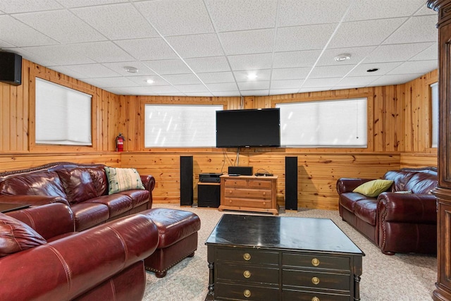 W4895 Big Bay Rd, Necedah, WI 54646 - carpeted living area with a drop ceiling and wooden walls
