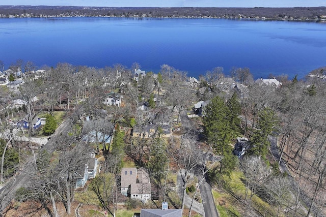 birds eye view of property with a water view and a residential view