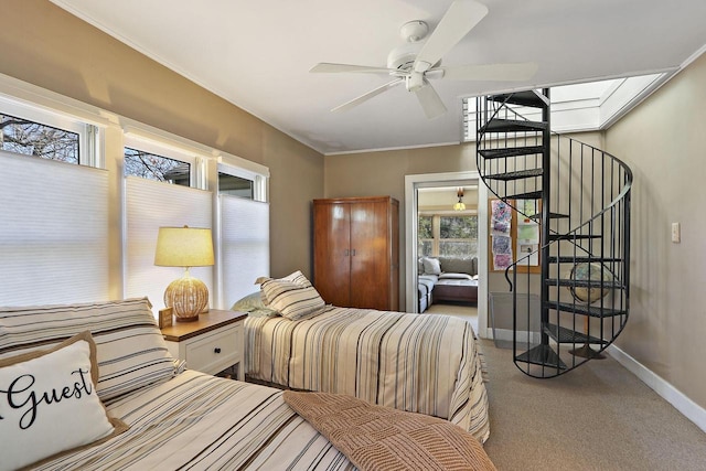 carpeted bedroom with baseboards and ornamental molding