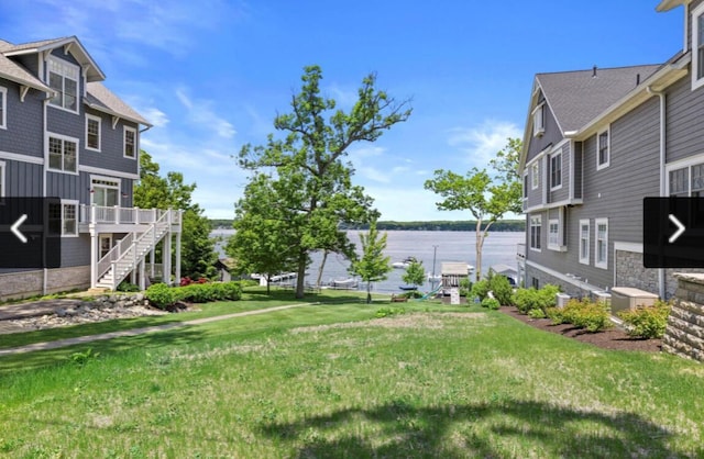 view of yard with a water view