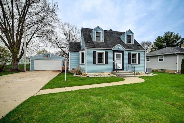 cape cod house featuring a detached garage, roof with shingles, an outbuilding, and a front yard