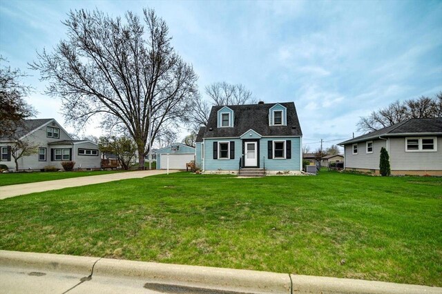 dutch colonial with an outdoor structure, a garage, central AC, a front yard, and entry steps