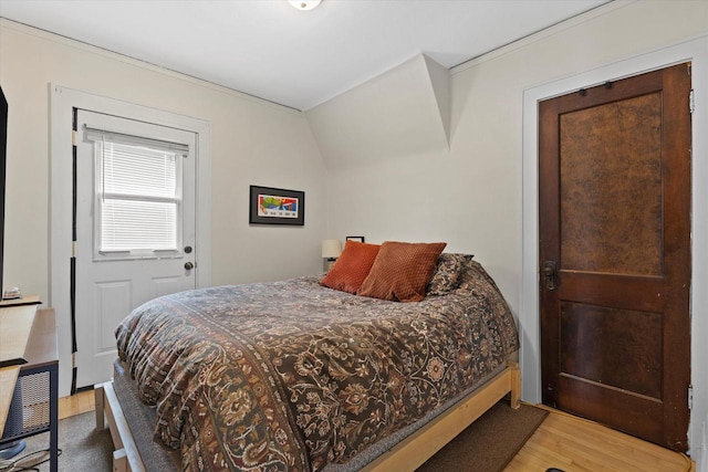 bedroom featuring wood finished floors
