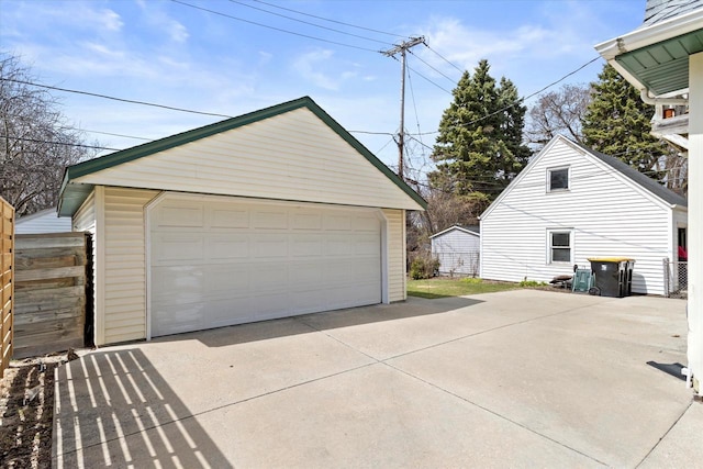 detached garage with fence