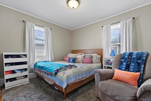 bedroom with ornamental molding
