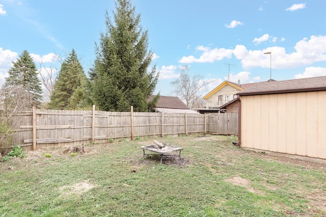 view of yard with a fenced backyard