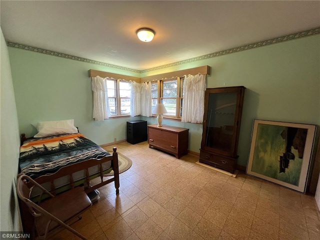 318 2nd Ave, Milltown, WI 54858 - bedroom with baseboards and light floors