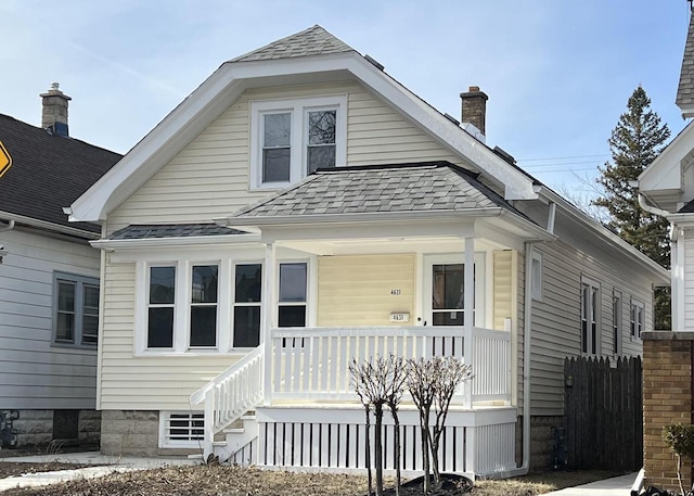 4631 N 37th St, Milwaukee, WI 53209 - bungalow-style home with covered porch and a shingled roof