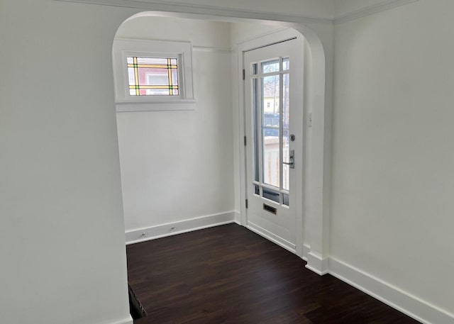 4631 N 37th St, Milwaukee, WI 53209 - entryway with arched walkways, baseboards, plenty of natural light, and dark wood-type flooring