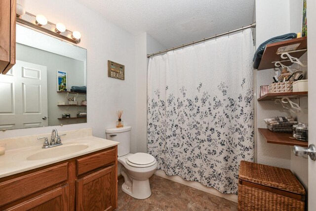 full bath with a shower with shower curtain, toilet, a textured ceiling, and vanity