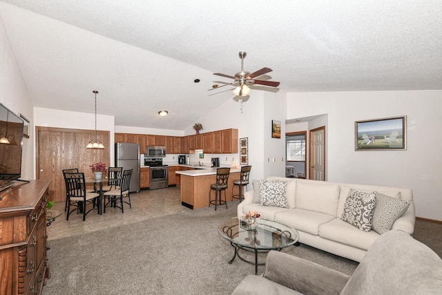 living area featuring a ceiling fan, high vaulted ceiling, and light carpet