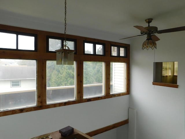 details with a ceiling fan