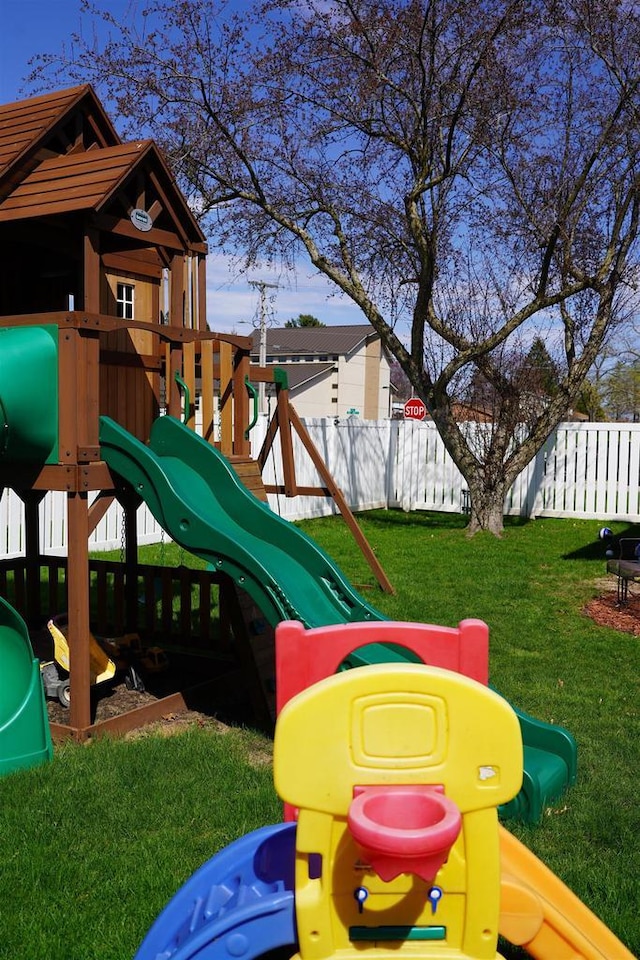 2005 Hollister Ave, Tomah, WI 54660 - view of play area featuring a lawn and fence