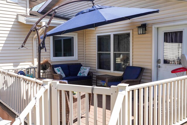 2005 Hollister Ave, Tomah, WI 54660 - wooden deck featuring an outdoor living space