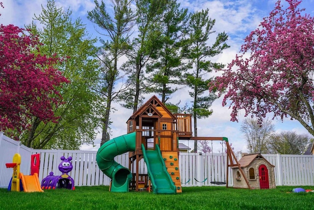 2005 Hollister Ave, Tomah, WI 54660 - view of play area with a lawn and fence