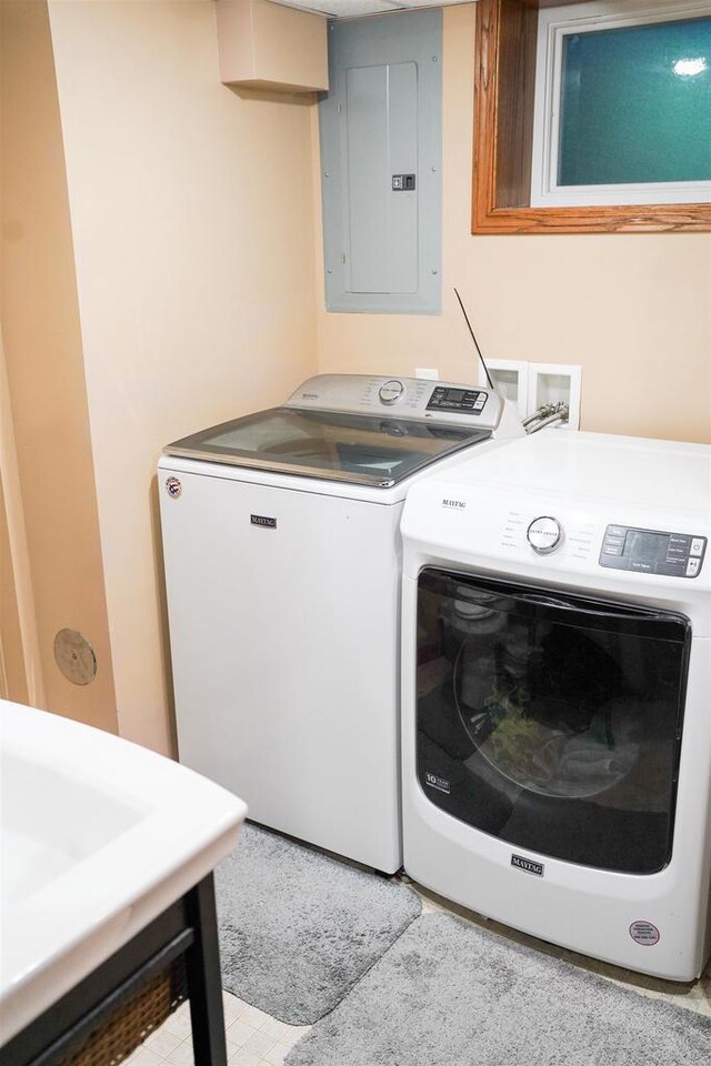 2005 Hollister Ave, Tomah, WI 54660 - clothes washing area with separate washer and dryer, laundry area, and electric panel