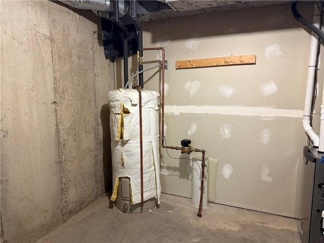 unfinished below grade area featuring water heater