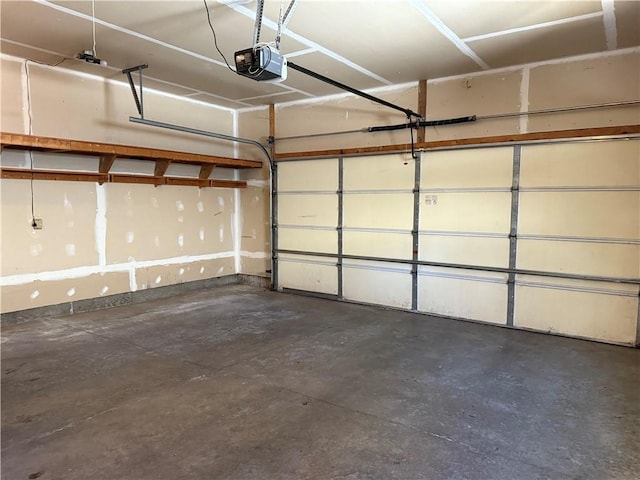 garage featuring a garage door opener