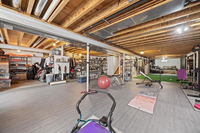 workout room with gas water heater