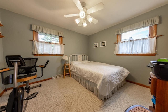 bedroom featuring a ceiling fan, carpet flooring, and baseboards