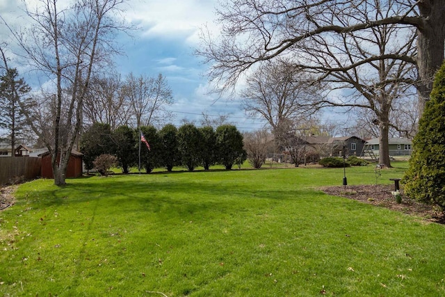 view of yard with fence