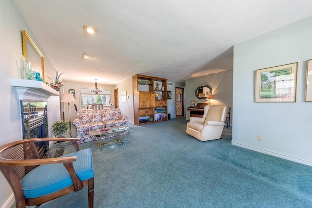 carpeted living room featuring a notable chandelier and baseboards