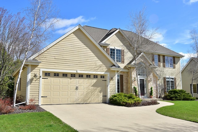 view of front facade with an attached garage, driveway, stone siding, and a front lawn