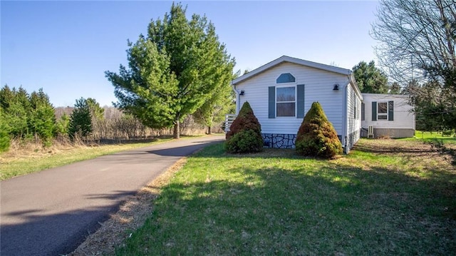23603 69th Ave, Cadott, WI 54727 - view of front of property featuring a front lawn and driveway